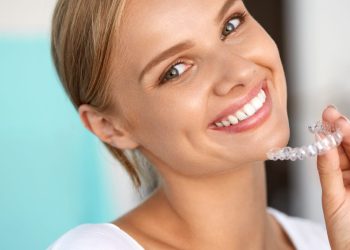 How Do Those Clear Plastic Trays Actually Straighten Your Teeth? The Hidden Science of Orthodontic Aligners